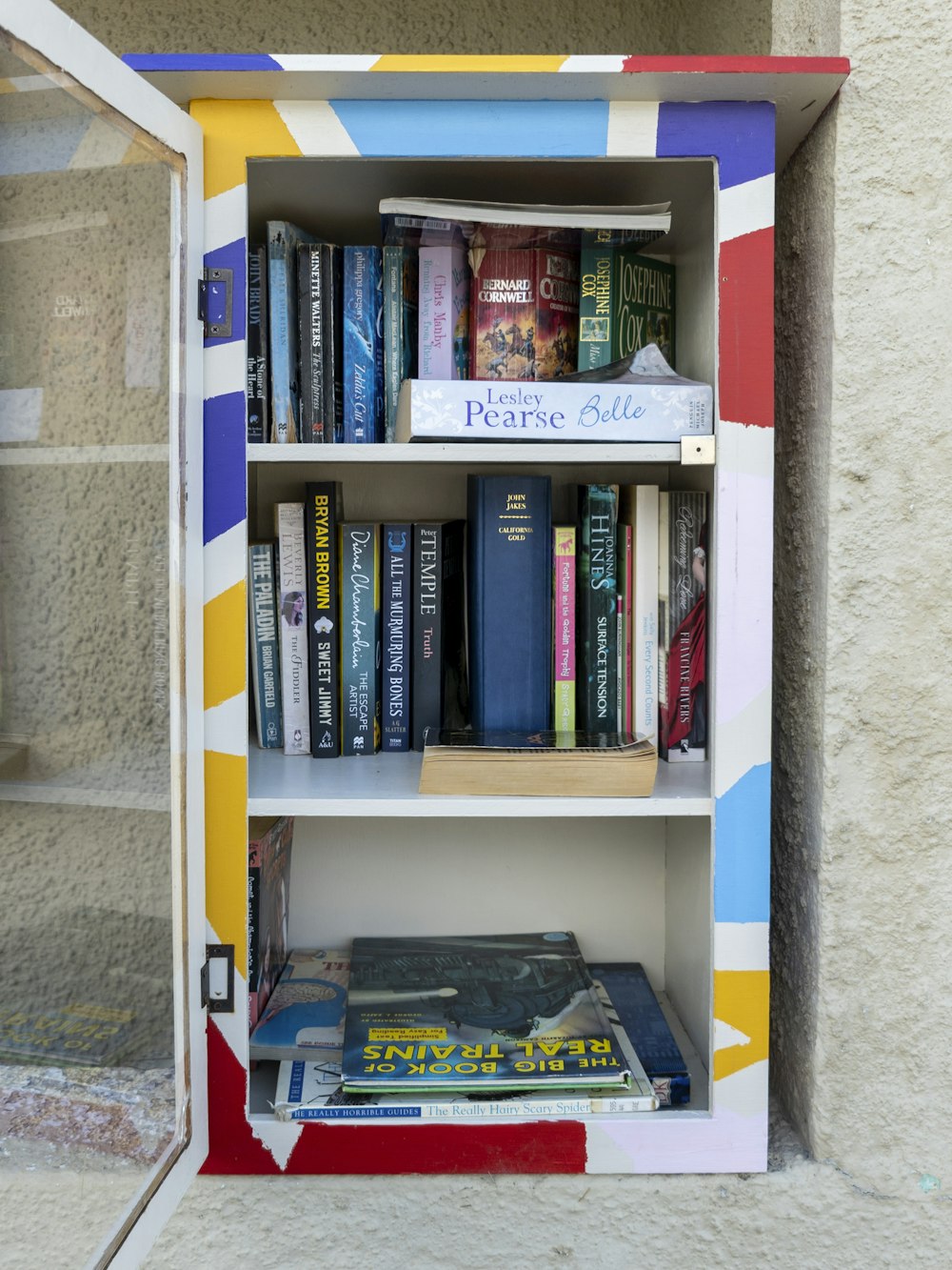 a bookshelf with a bunch of books in it