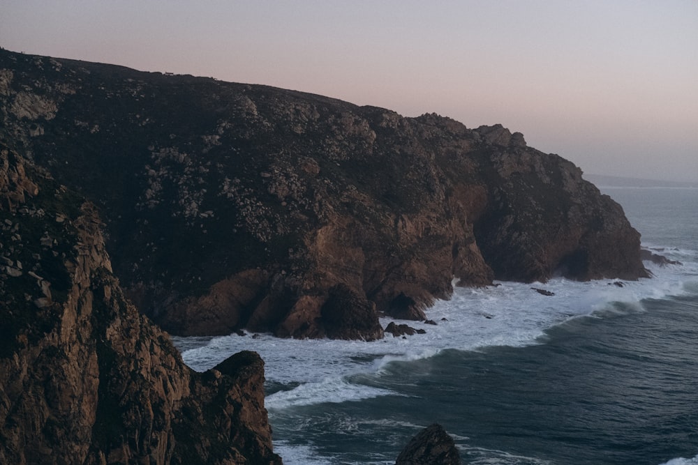 a view of the ocean from the top of a mountain