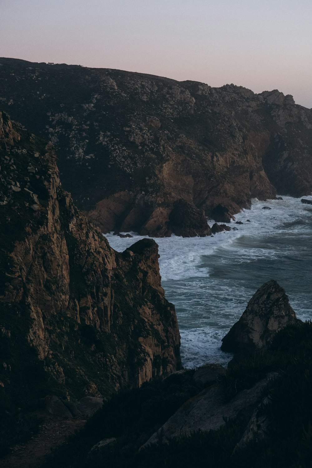 a large body of water surrounded by mountains