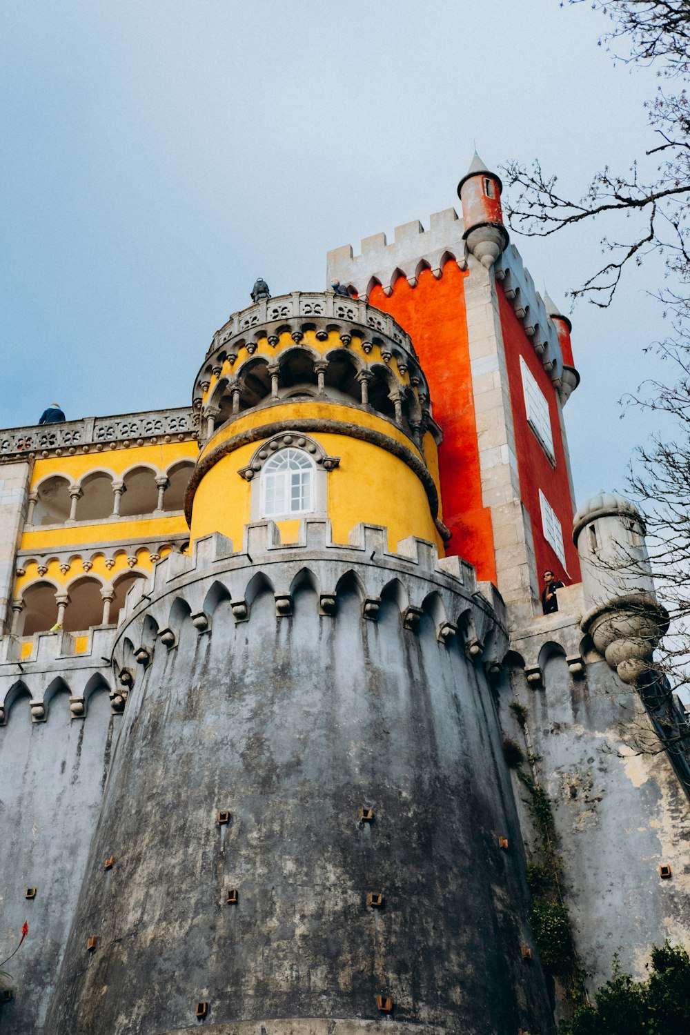 a tall tower with a clock on the top of it