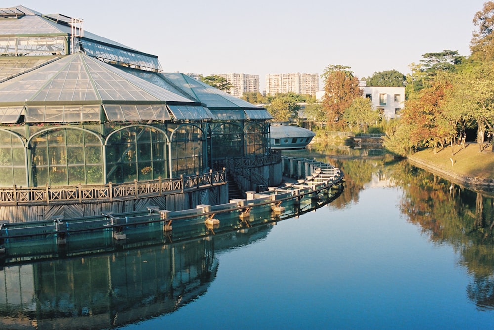 a large building sitting next to a body of water