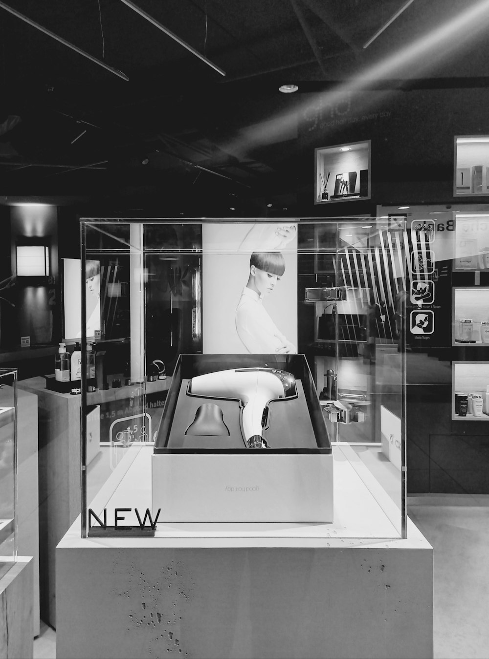 a black and white photo of a store display