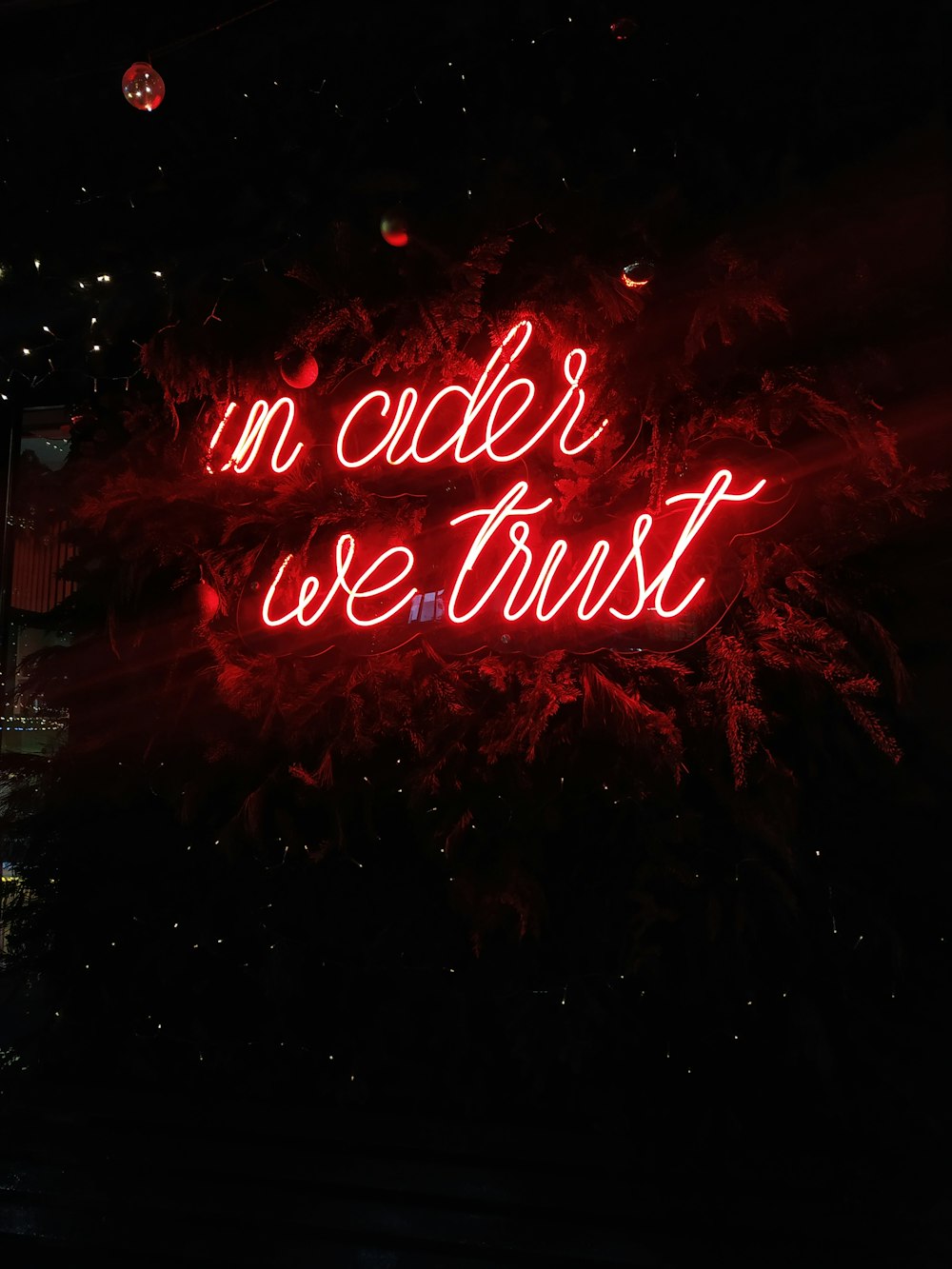 a neon sign that says no order we trust