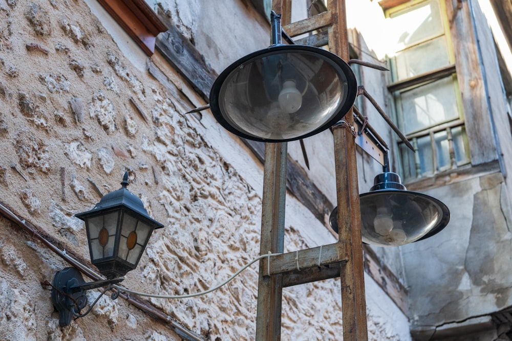 a couple of lights that are on the side of a building