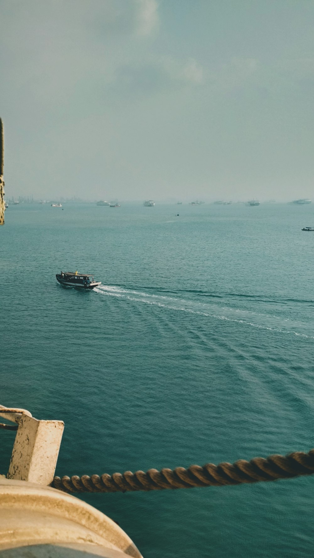 a boat traveling across a large body of water