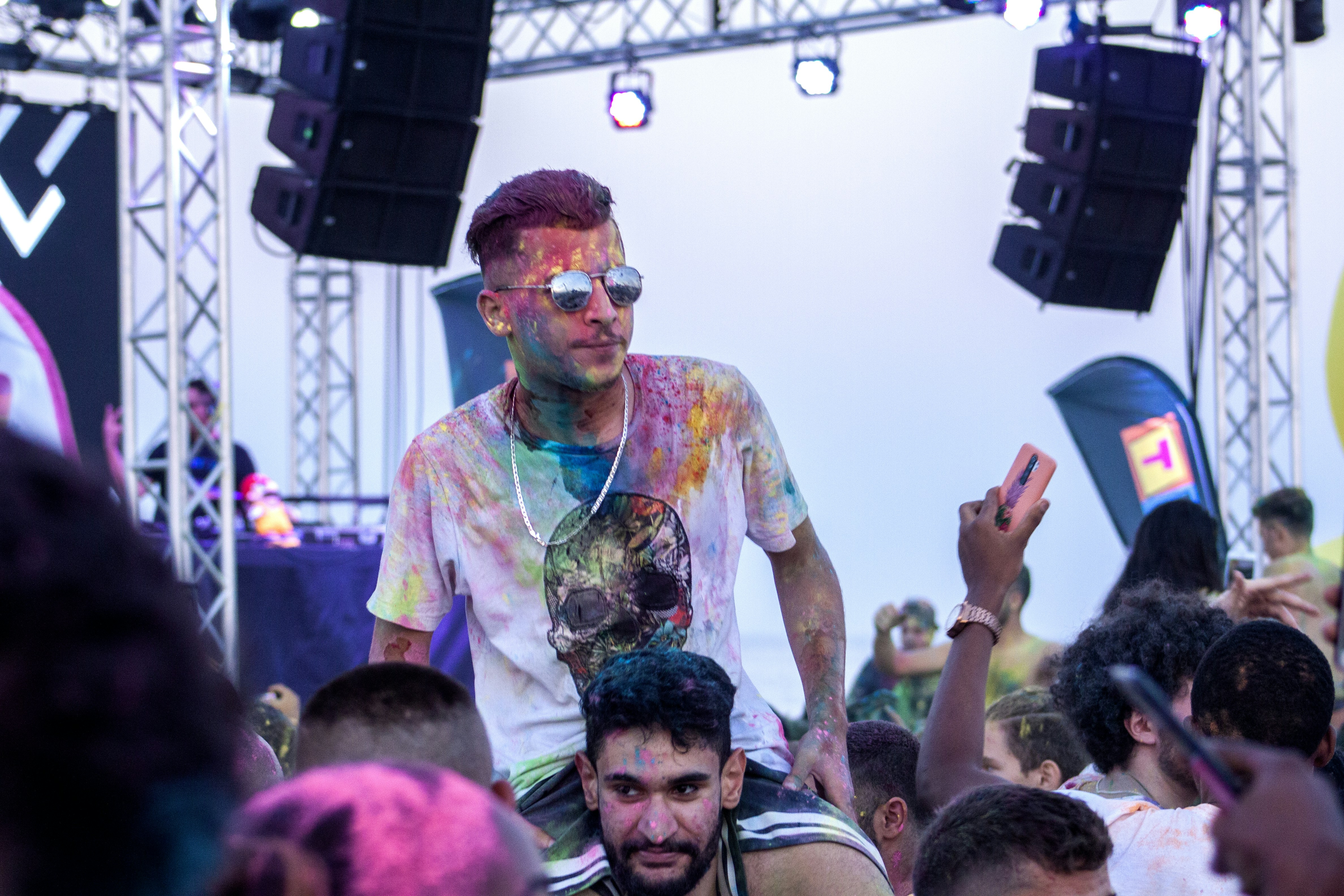 a group of people standing in front of a crowd