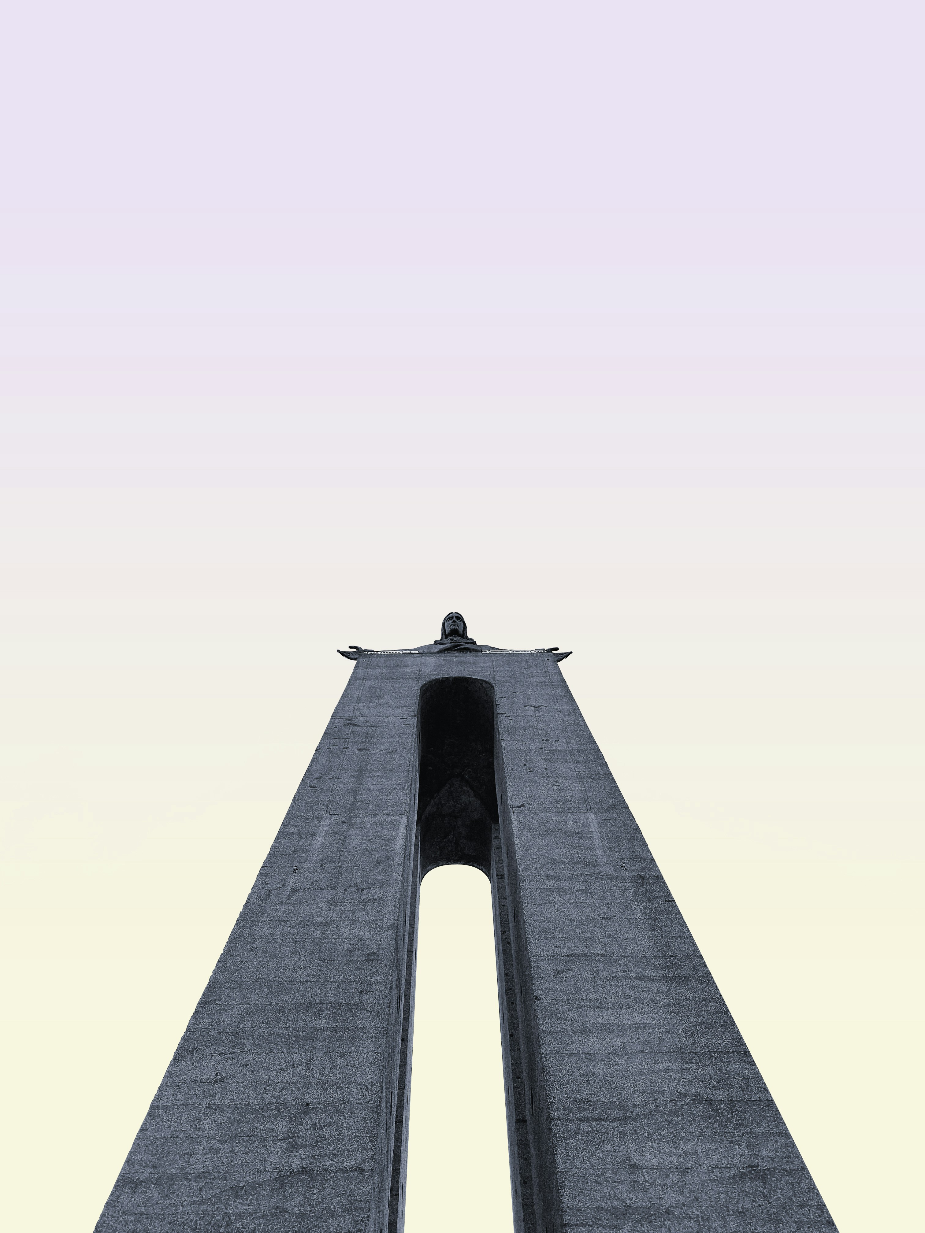 a large tall tower with a sky background