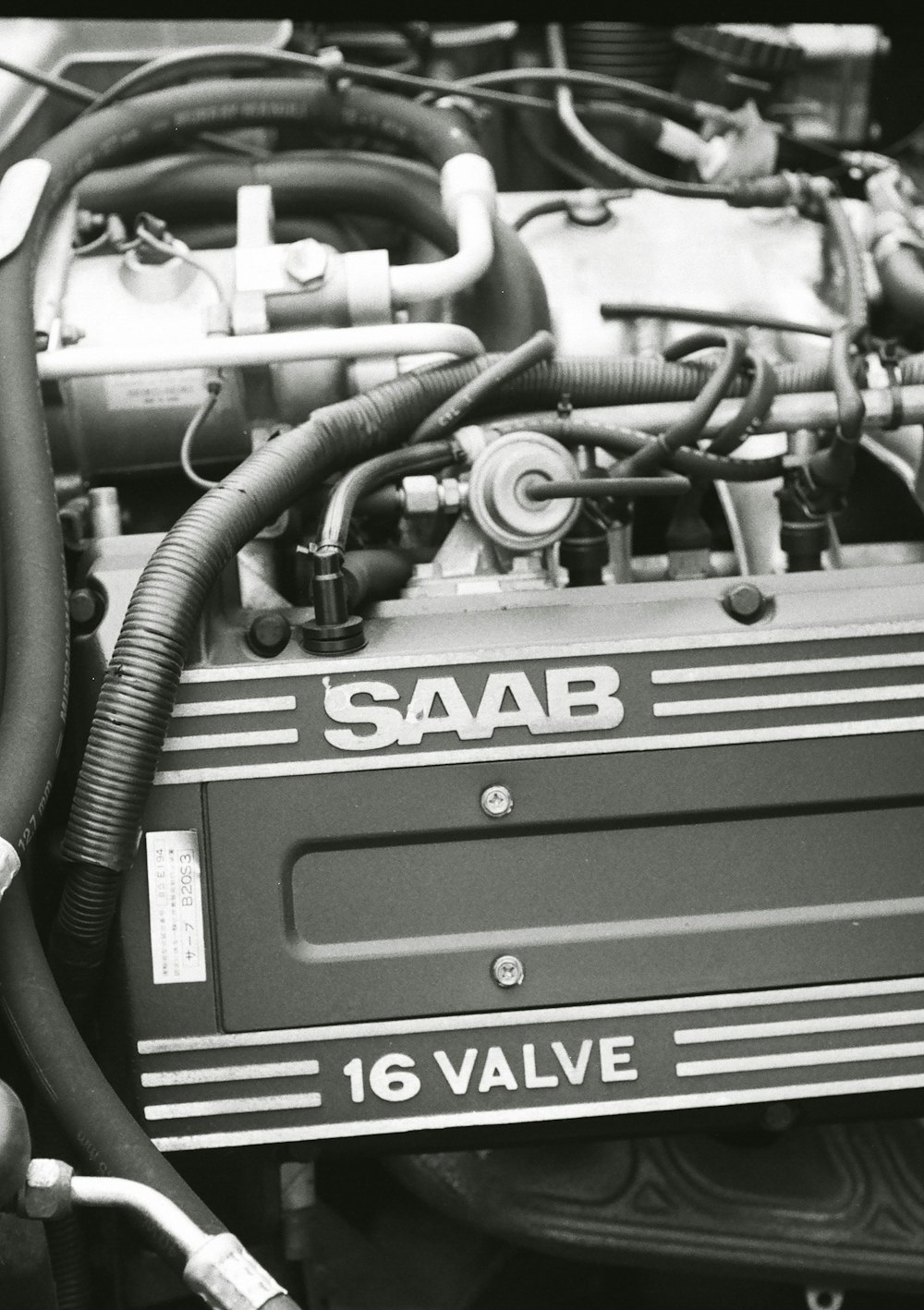a black and white photo of a saab engine