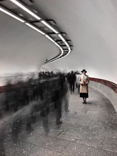 a group of people walking down a street