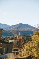 a tall tower with a clock on top of it