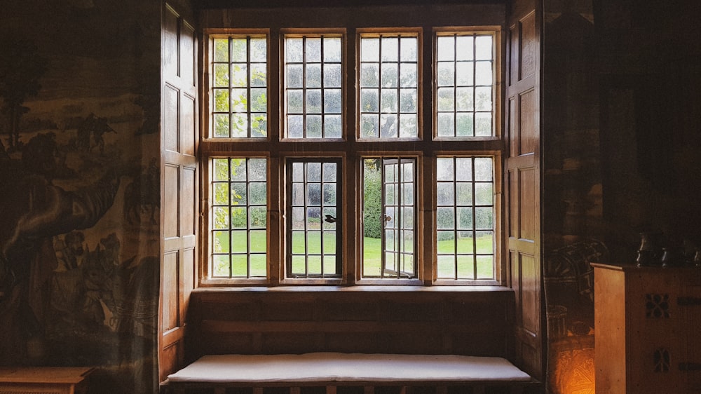 a window with a bench in front of it