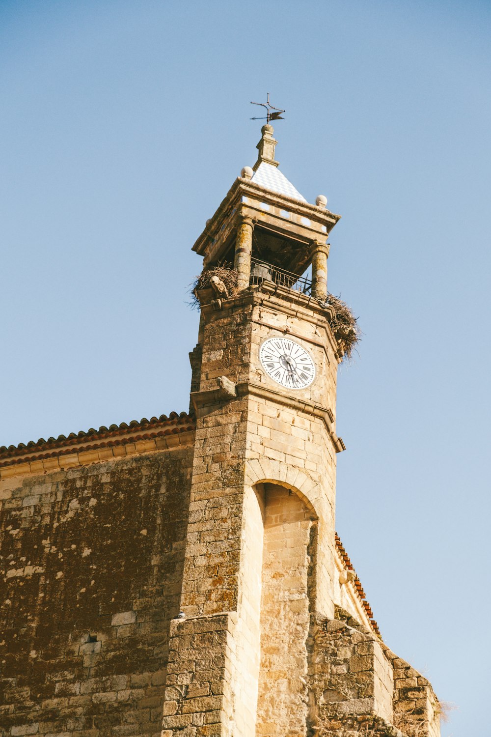 a tall tower with a clock on top of it