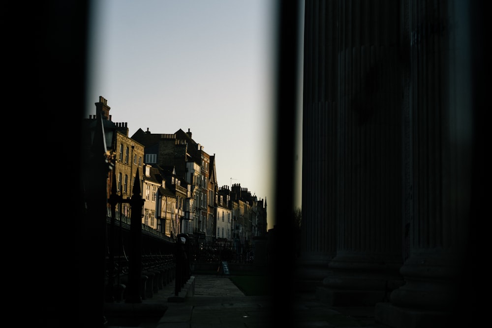 a view of a row of buildings through a window