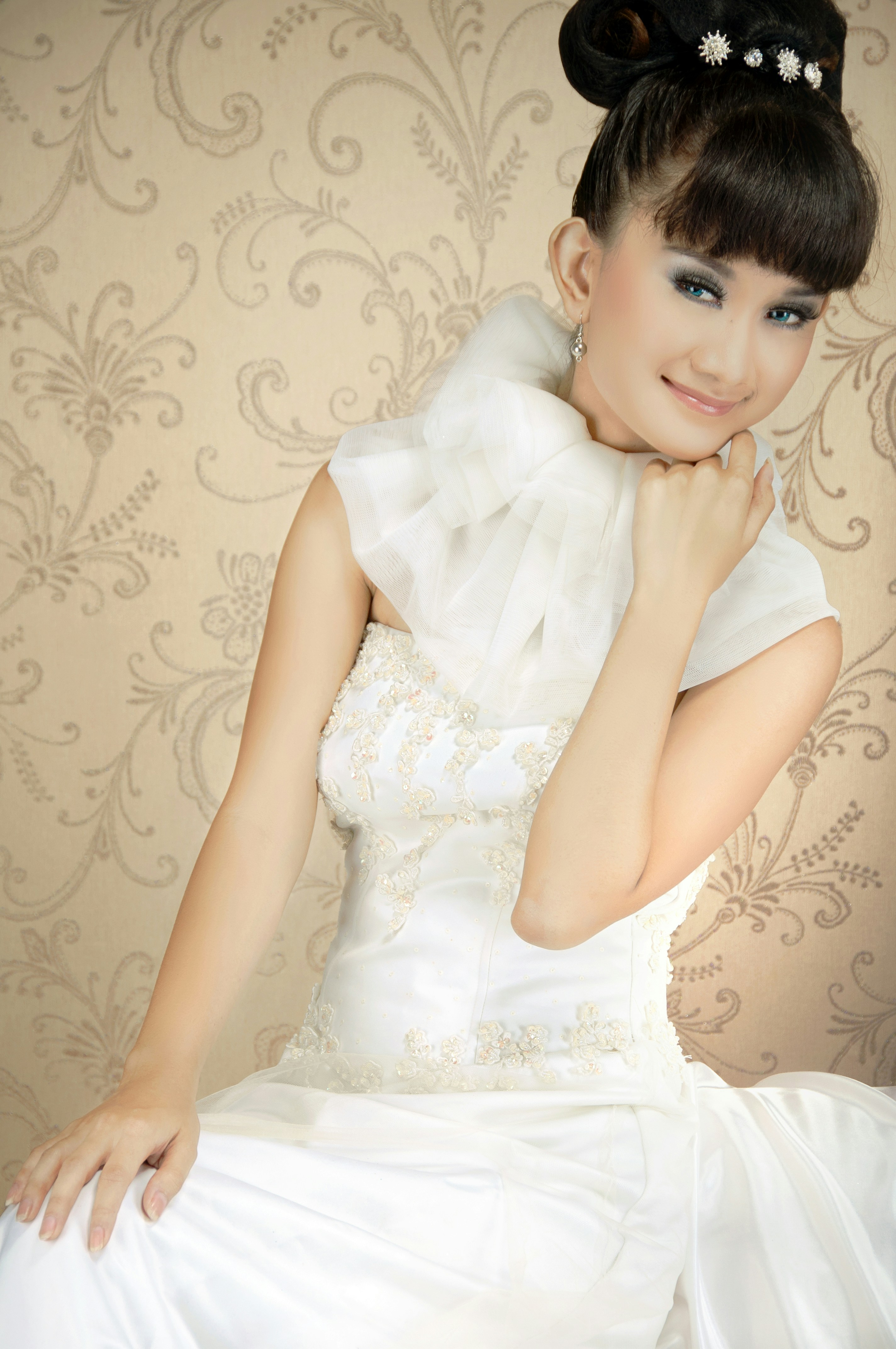 A woman in a white dress posing for a picture photo – Free Jakarta ...