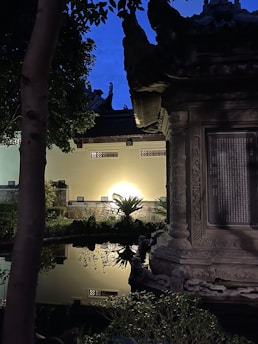 A serene, mystical garden bathed in soft golden light, with ancient calligraphy floating gently in the air.