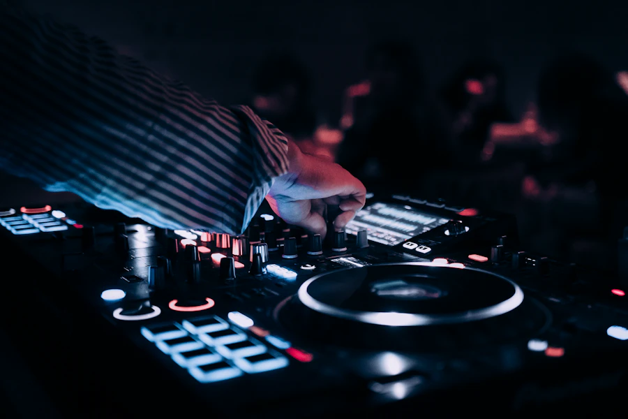 DJ mixing music in front of the crowd at Moonlight Lounge