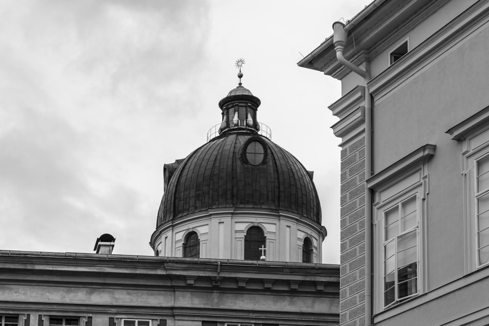 a black and white photo of a dome on top of a building