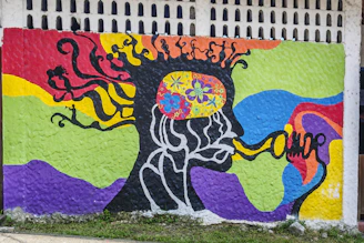a colorful mural on the side of a building