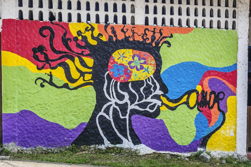 a colorful mural on the side of a building