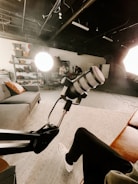 a room with a couch and a microphone in it