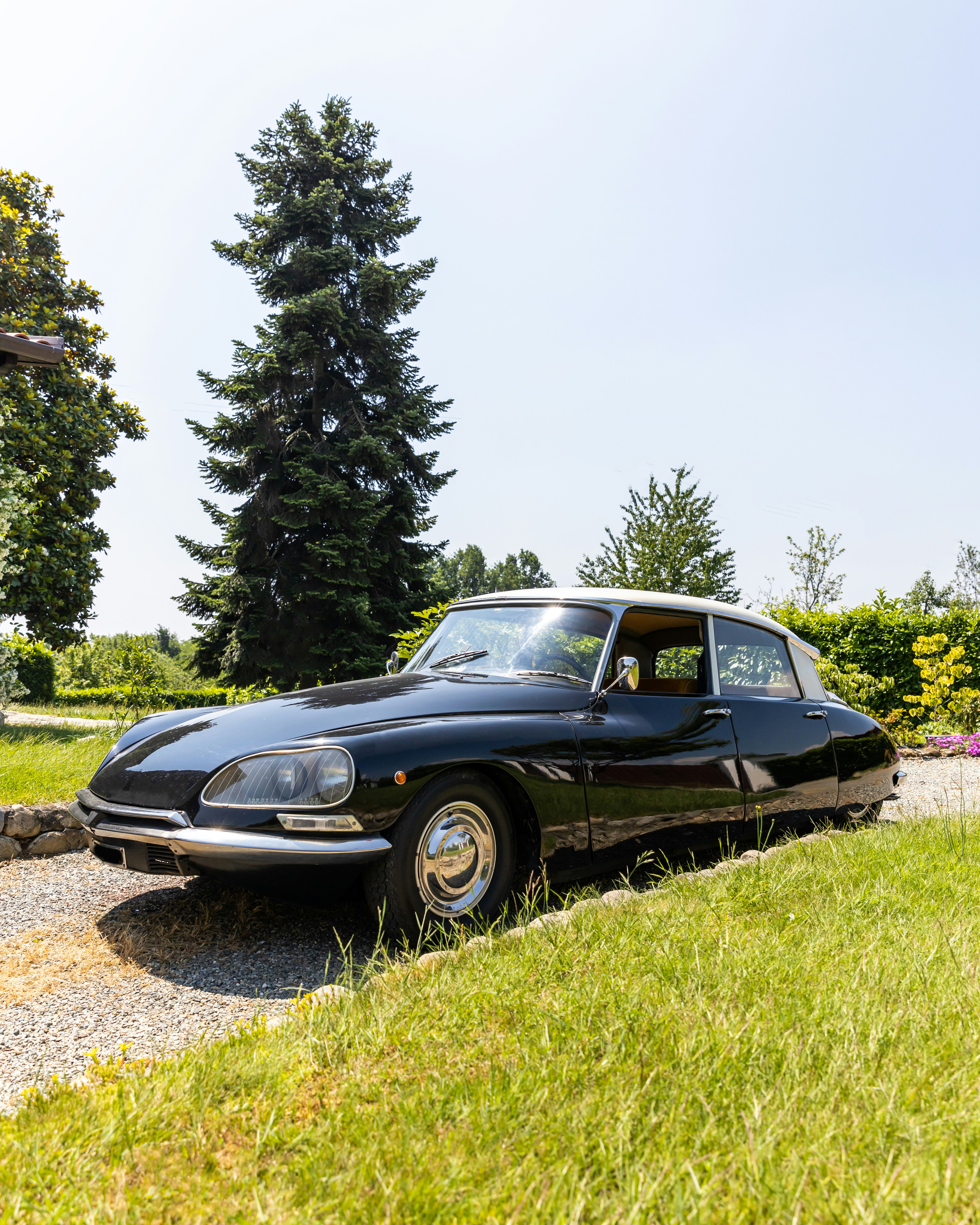 a black sports car parked on the side of a road