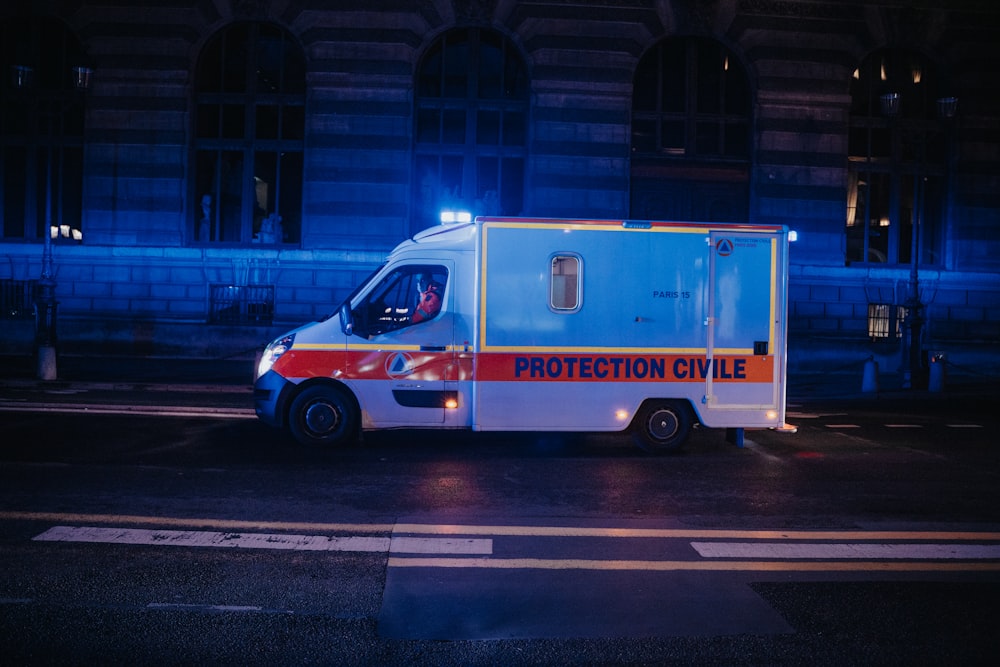 an ambulance parked on the side of the road