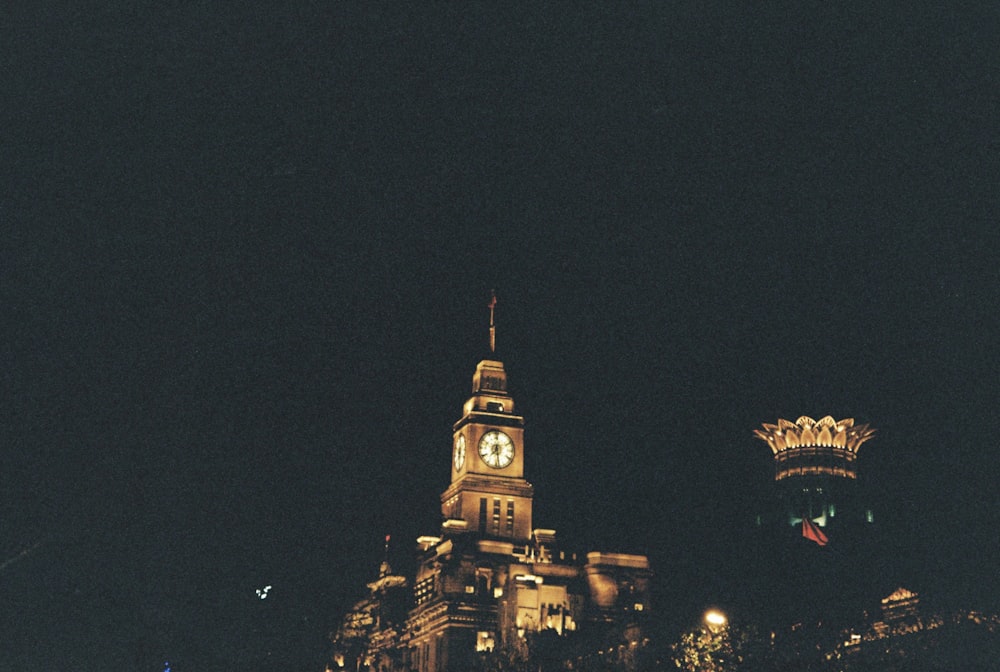 a very tall building with a clock at the top