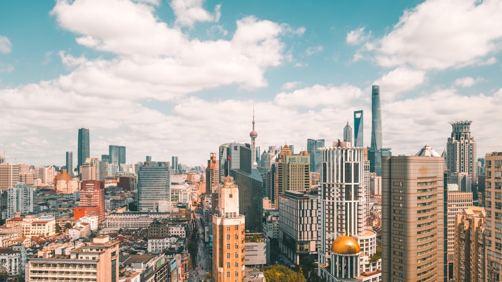 a view of a city with tall buildings