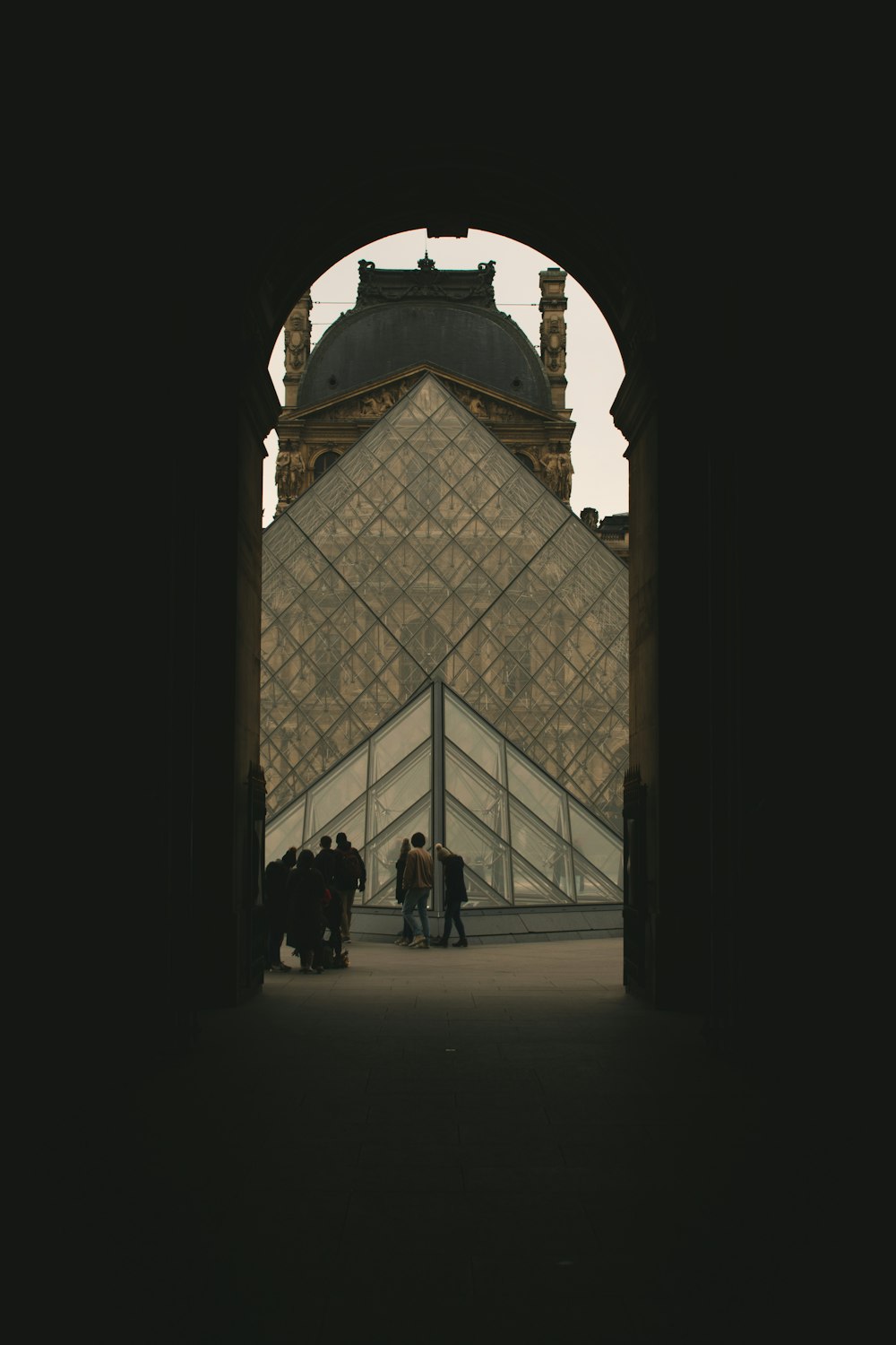 a group of people standing in front of a building