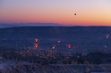 A stunning view of hot air balloons at sunrise.