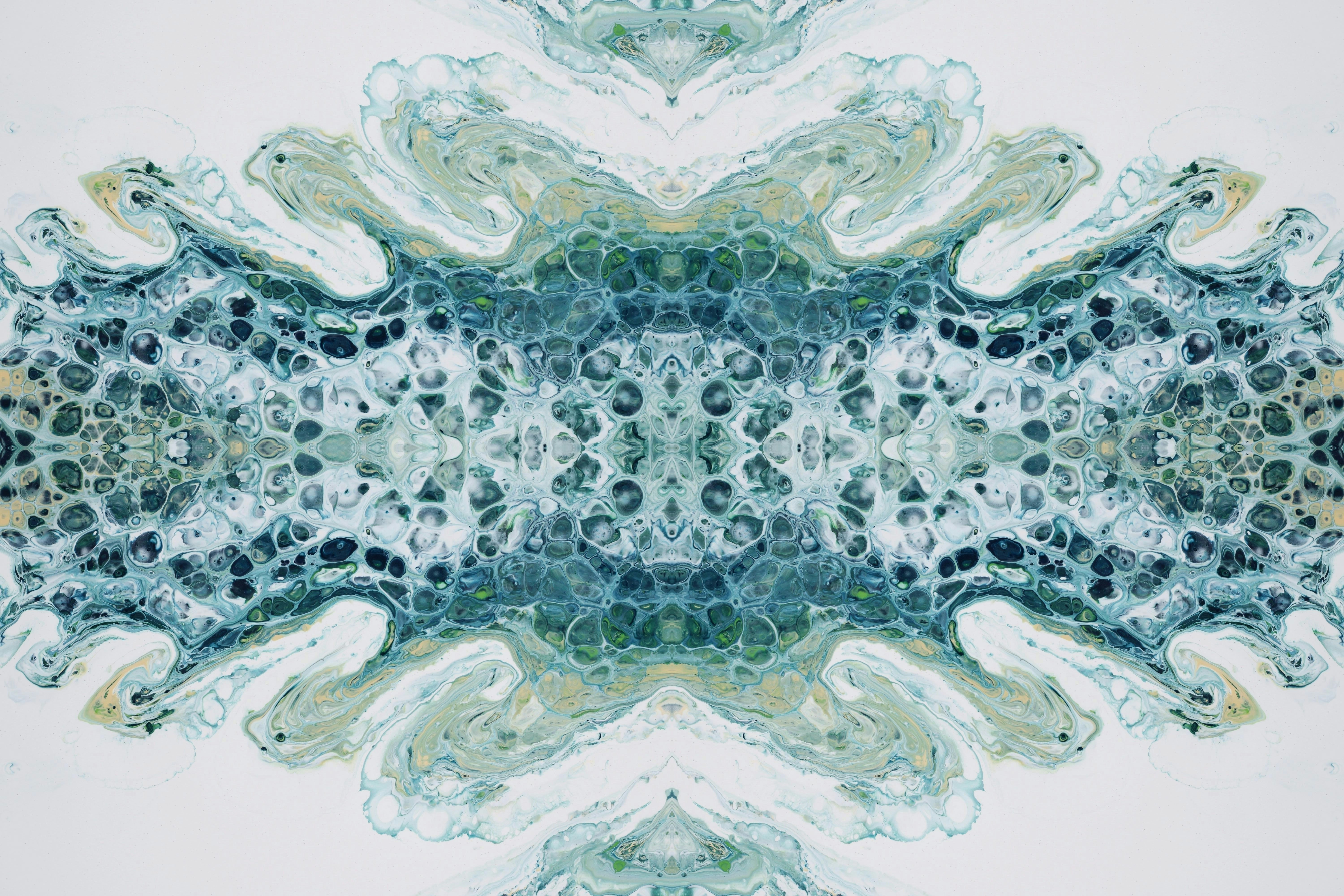 a blue and green abstract design on a white background, 