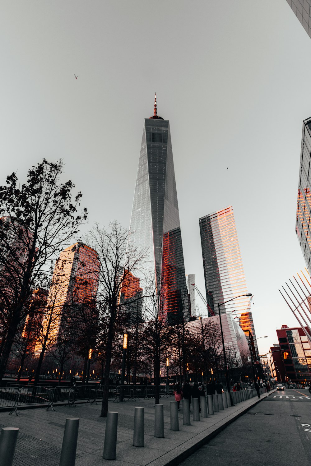 a very tall building towering over a city