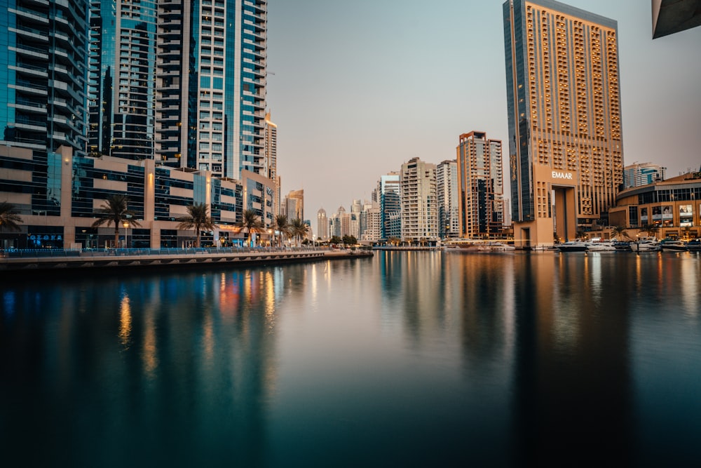 a body of water surrounded by tall buildings