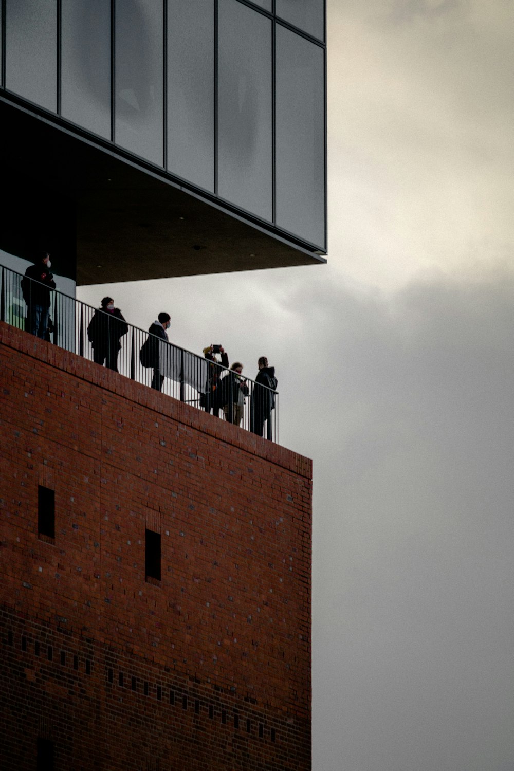 a group of police officers standing on top of a building