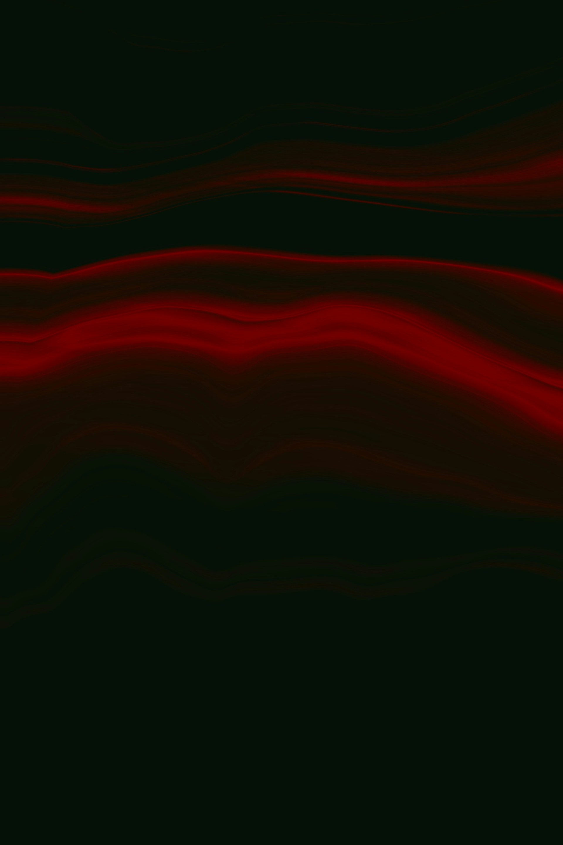 a black and red background with wavy lines