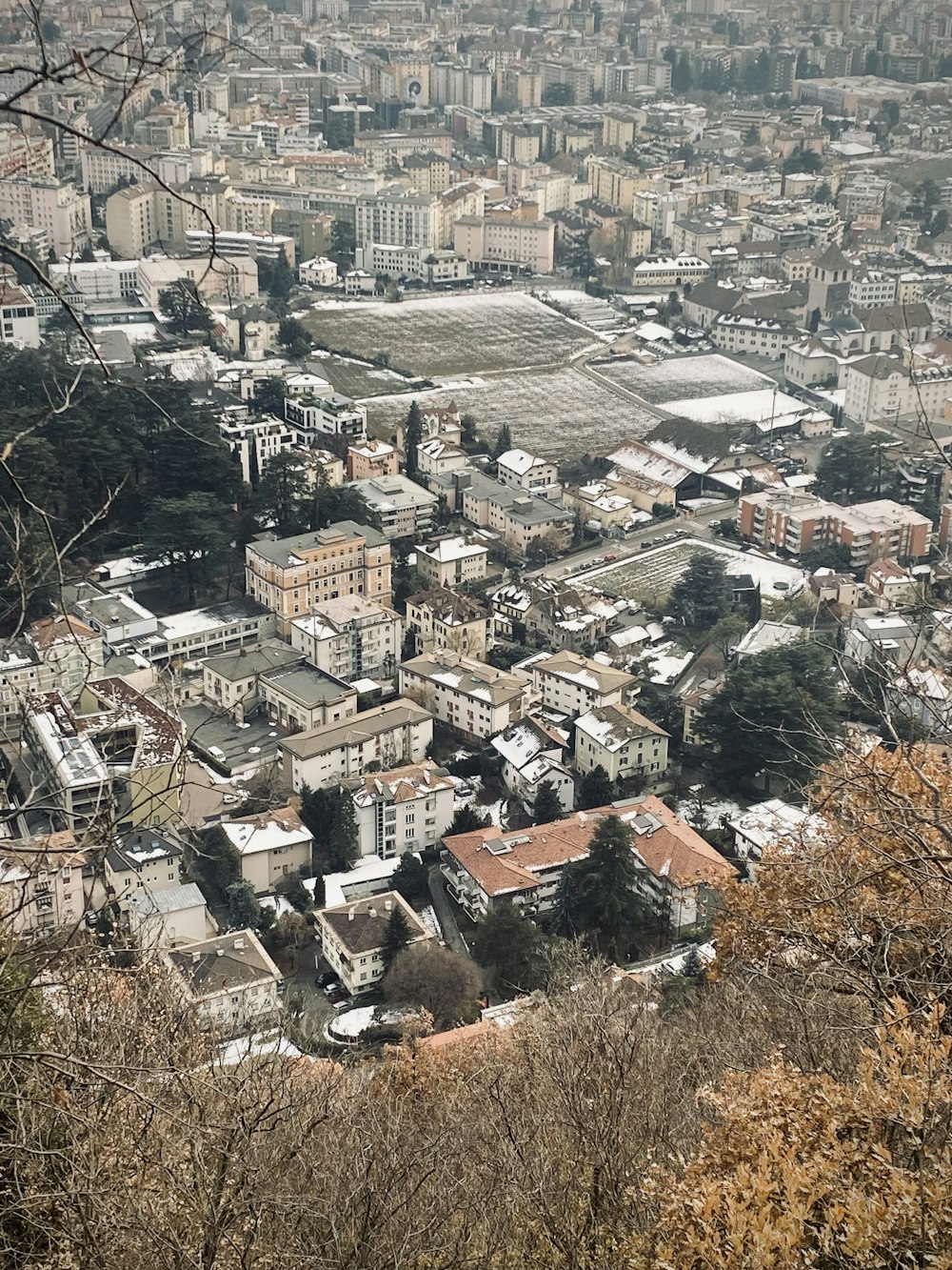 a view of a city from the top of a hill