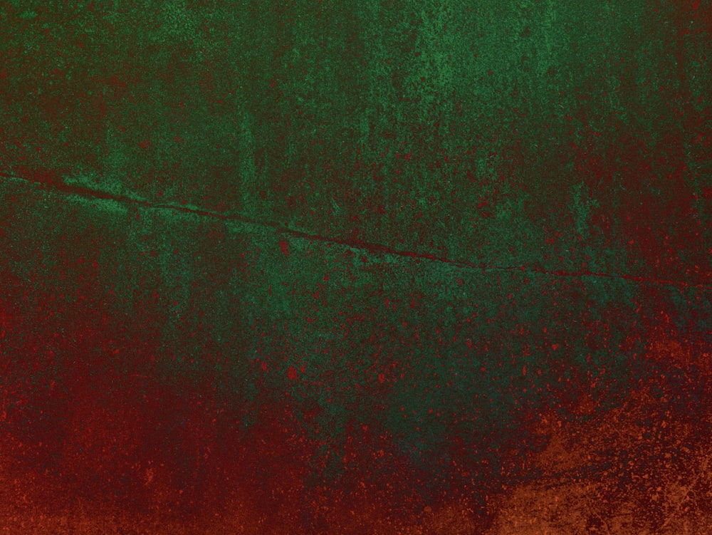 a red and green background with a black border
