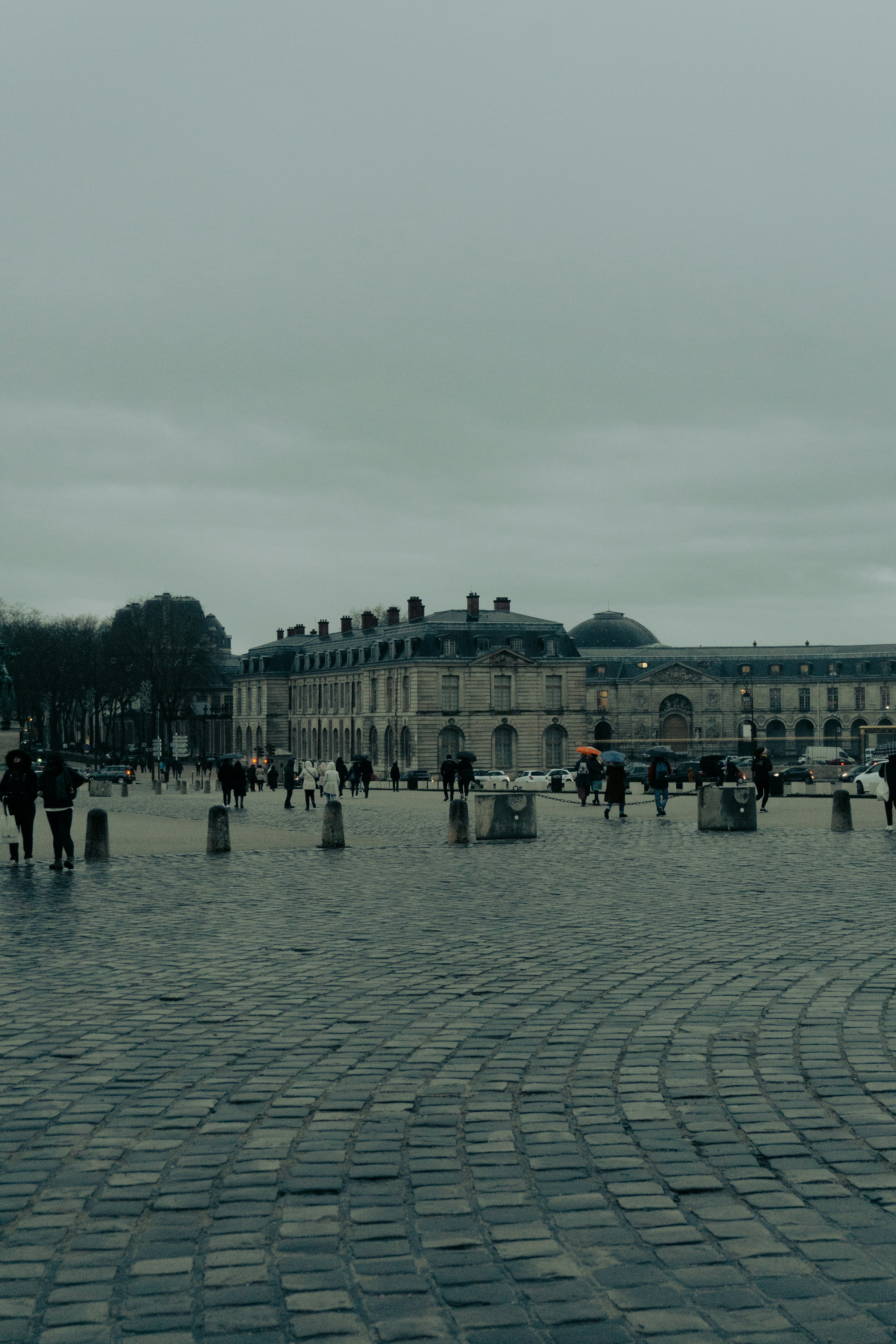 Wide view of Versailles Gardens with fountains and pathways