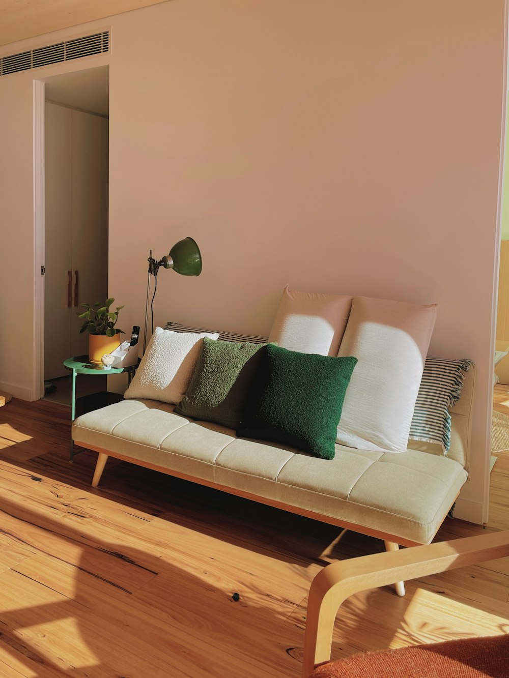 a living room with a couch and a table