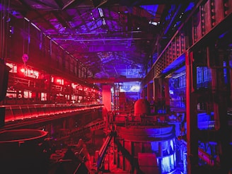 a large room with red and blue lights