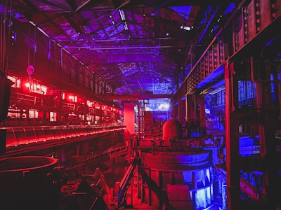 a large room with red and blue lights