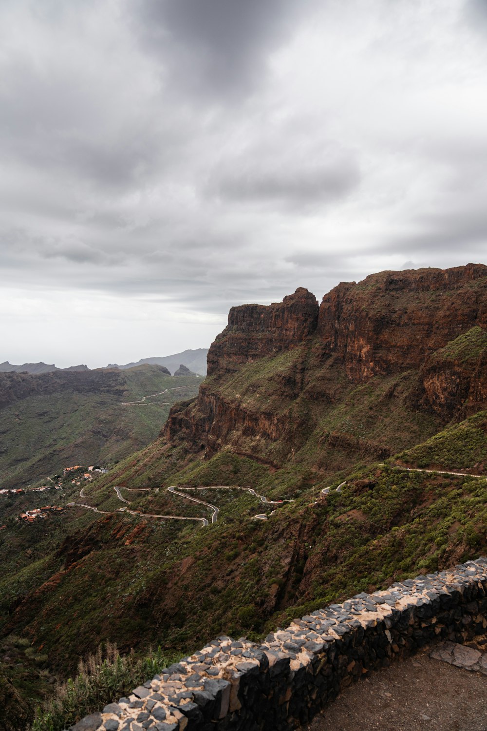 a view of a mountain with a road going through it