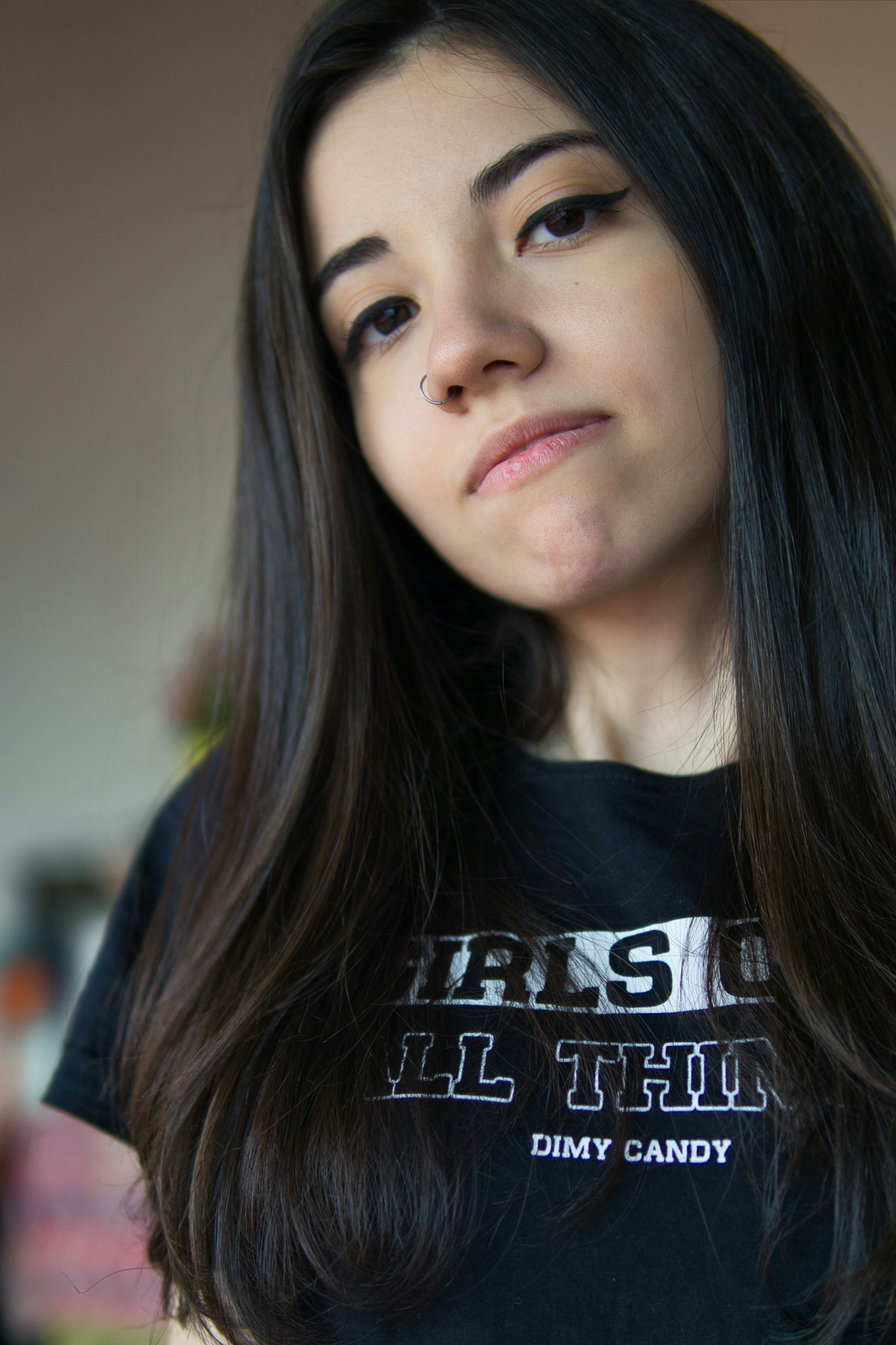 A woman with long black hair wearing a black shirt photo – Free ...