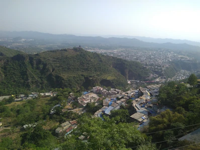 a view of a small village in the mountains