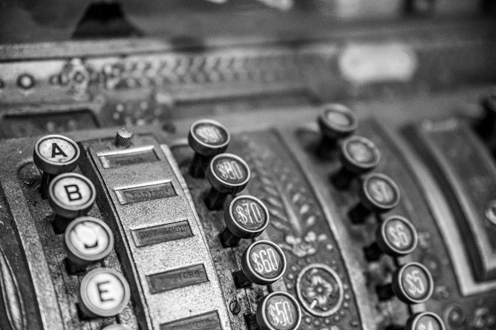a close up of an old fashioned typewriter