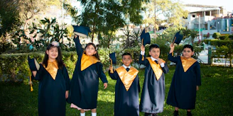 a group of young people standing next to each other