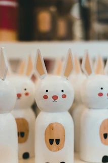 a close up of a group of plastic rabbits