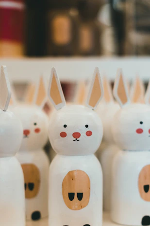 a close up of a group of plastic rabbits