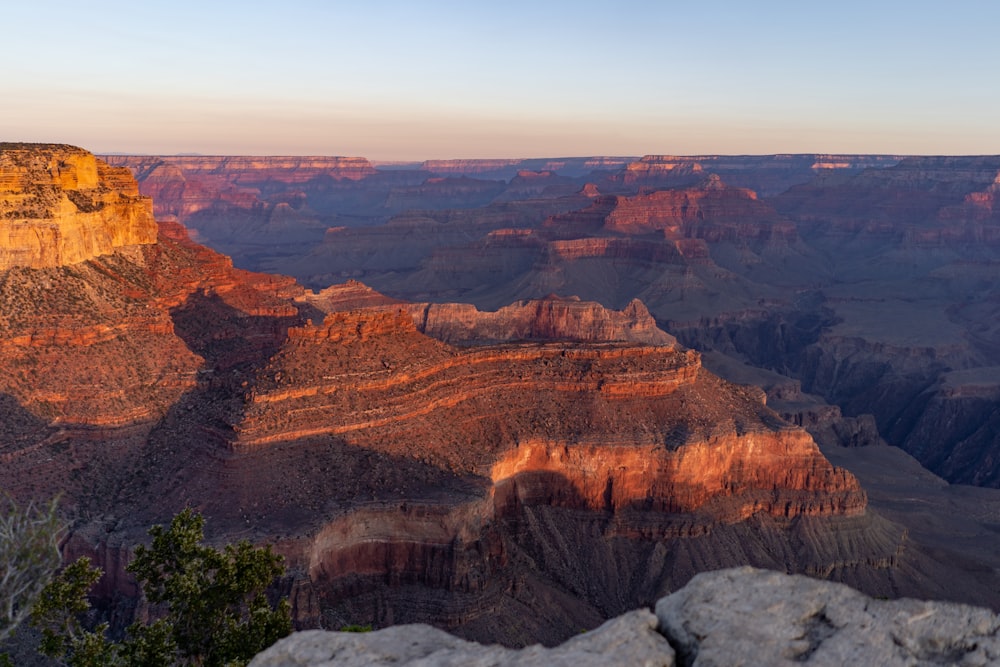 a view of the grand canyon at sunset