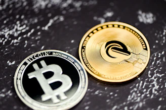a bitcoin coin sitting on top of a table